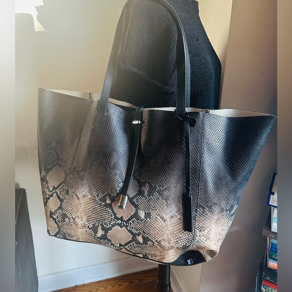 VINCE CAMUTO NWT BIG tote. Great for travel it mini weekender bag. Bag for sale